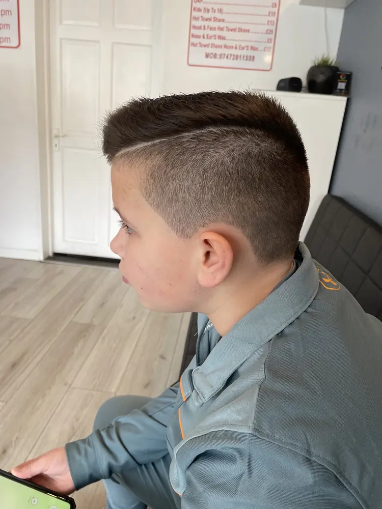 Feroz mid-cut with a young customer at Sultan Ottoman Turkish Barber